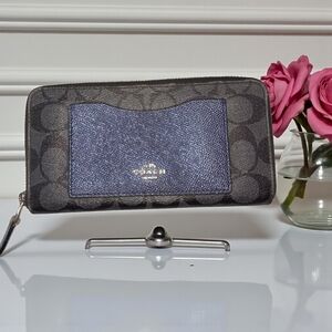 Coach Accordion Zip Wallet in signature canvas with a contrasting metallic blue